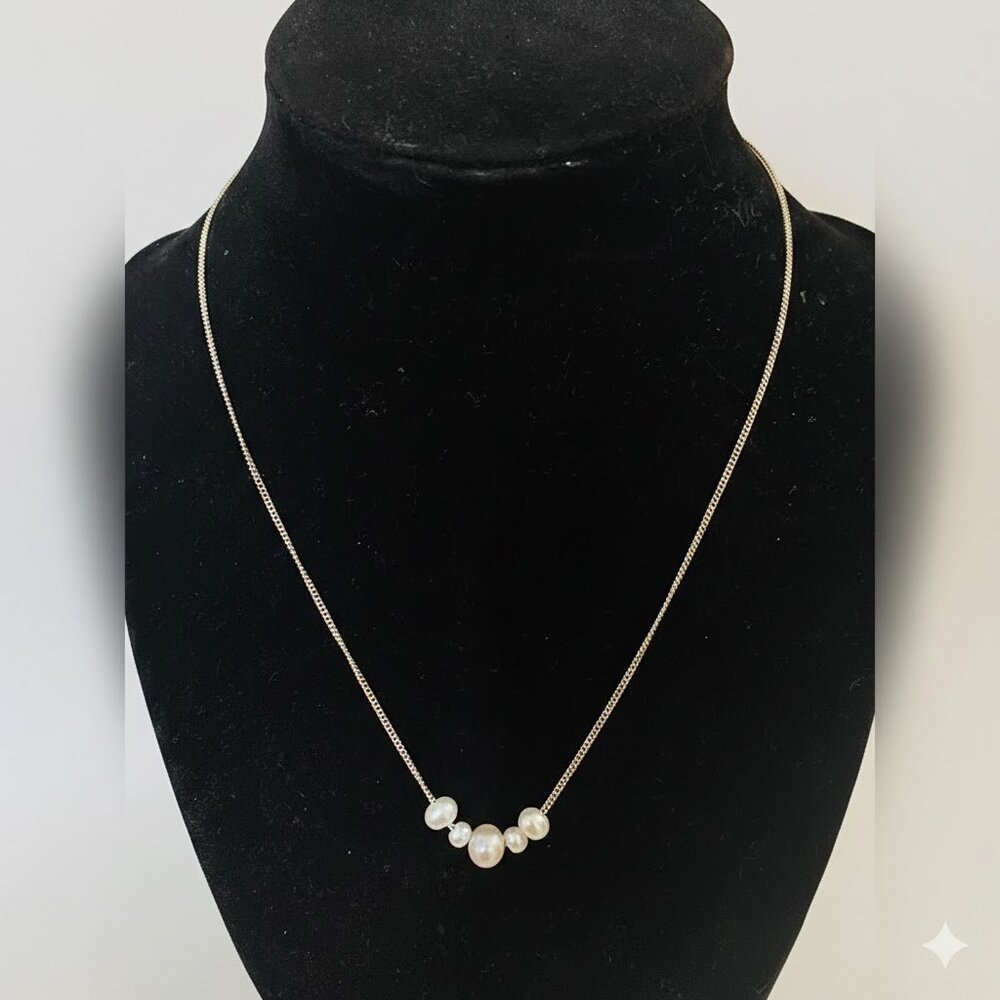Genuine Pearls set on Sterling Silver